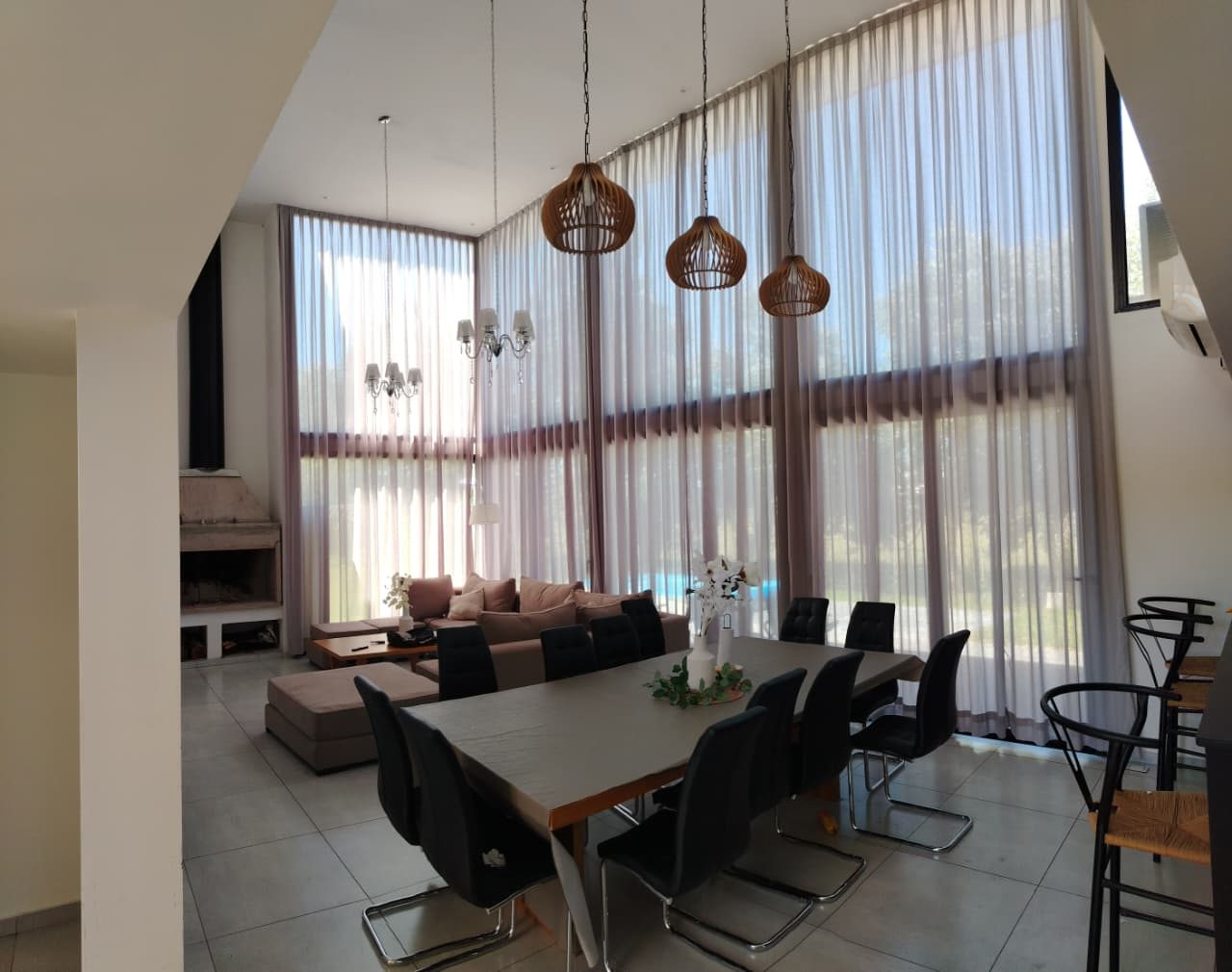 Cortinas en aberturas de doble altura